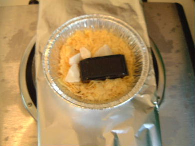 The rosin, beeswax and carnauba wax before melting to make the
      electret.
