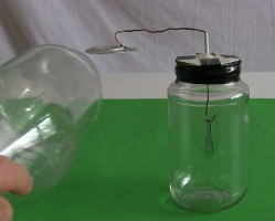 Testing the polarity of the bottom of the electret using
      my inductively charged homemade/DIY electroscope.
