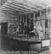 One of Tesla's assistants at the variable-inductance crank, Colorado Springs experimental station, 1899. -- # 12